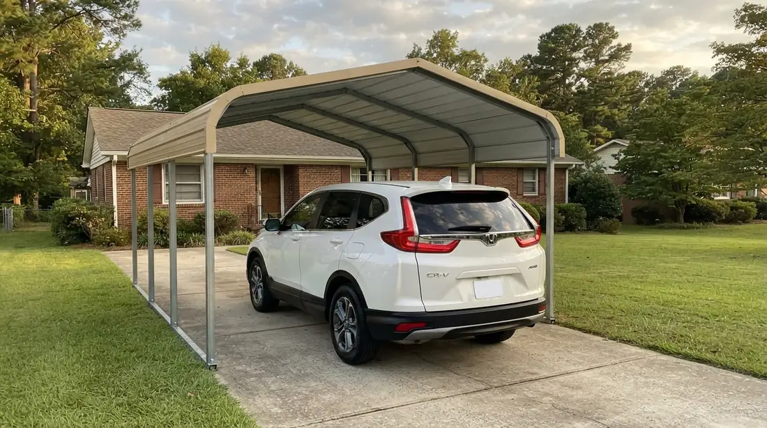 Freestanding steel carport covering a 2022 Honda CR-V on a residential driveway beside a single-story brick home