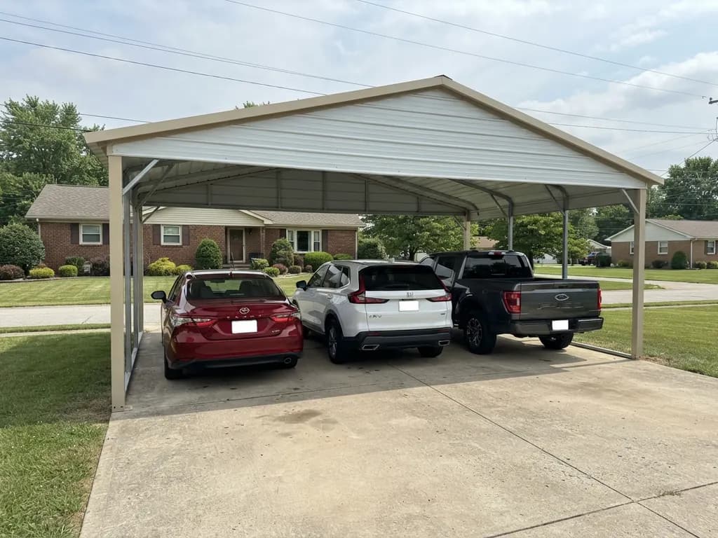 2025 Camry, 2025 CR-V and 2026 F-150 parked three across a carport that is 30 ft wide and 20 ft deep